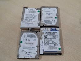 Discos duros, Pendrives, tarjetas de memoria y cámara de fotos marca Canon